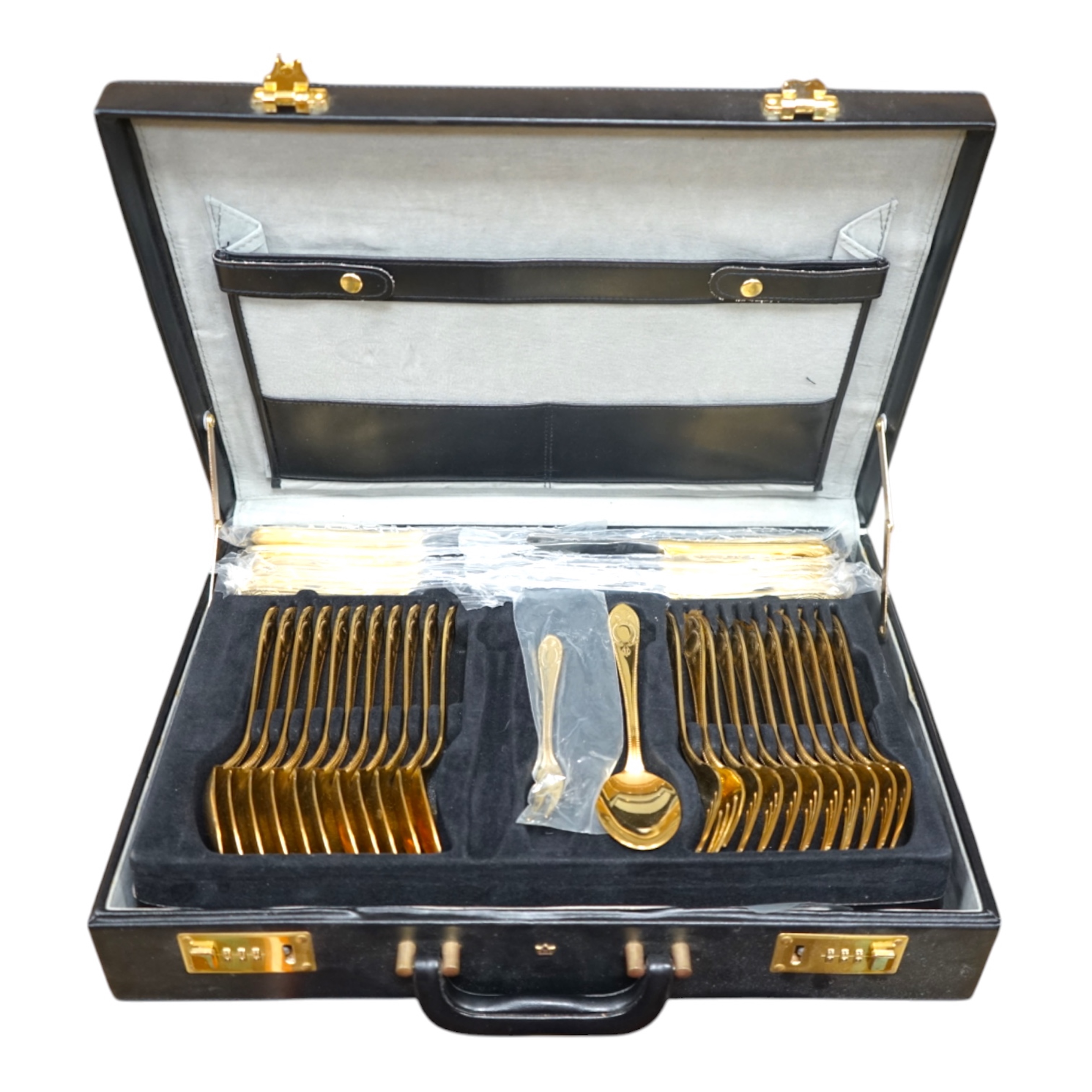 A Bestecke gold plated canteen of cutlery. Condition - good